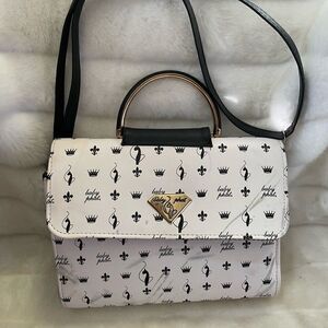 Baby Phat black and white logo satchel/shoulder bag with gold tone accent.